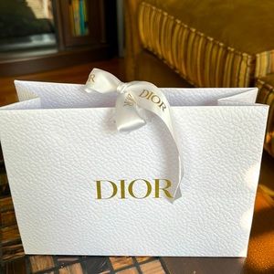 Dior paper bag gift wrap, paper strips, Dior card holder and fabric bag.